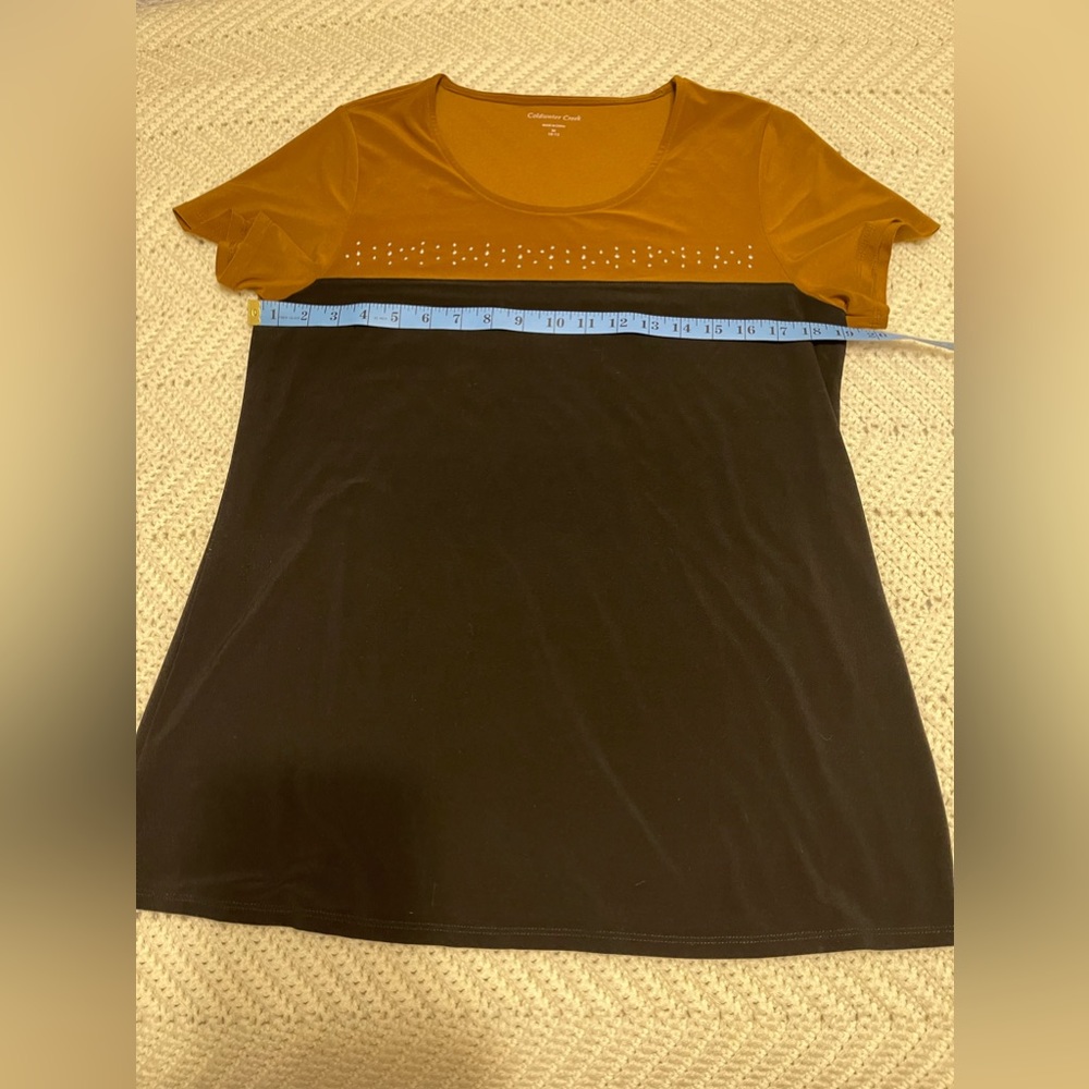 Coldwater Creek top. Very cool with studs.